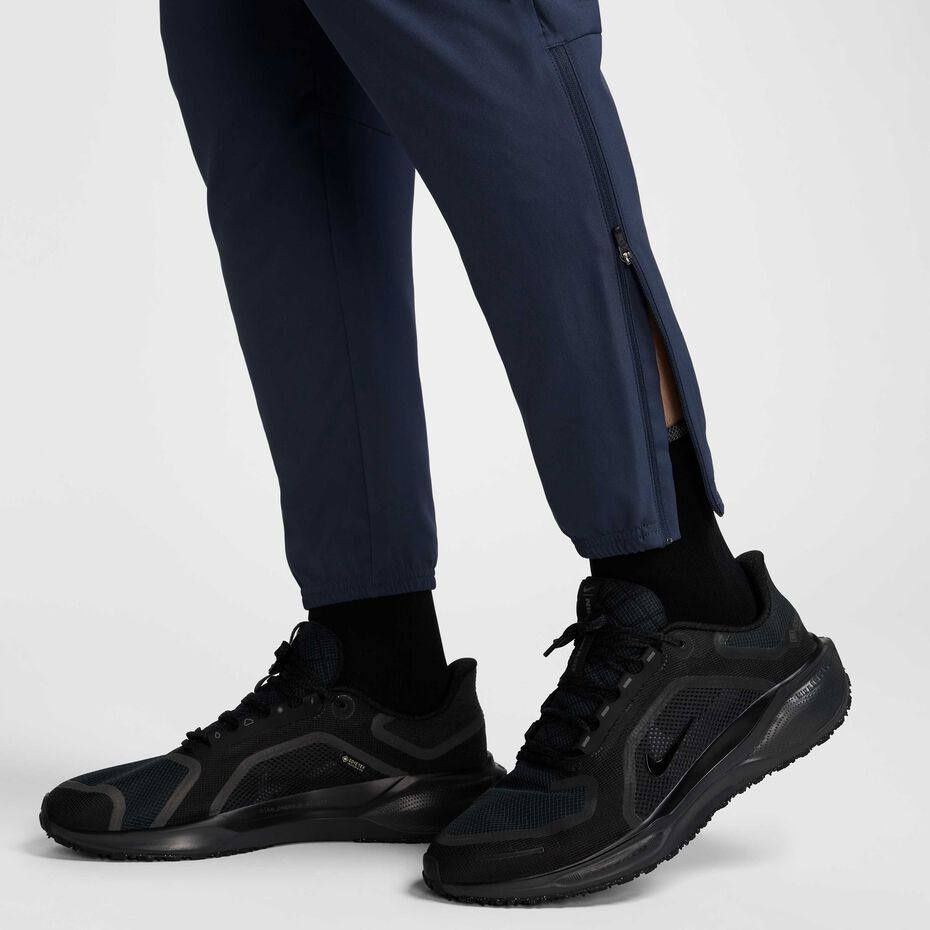 Штани Nike Challenger Dri-Fit Woven Running Trousers FQ4780-437 фото