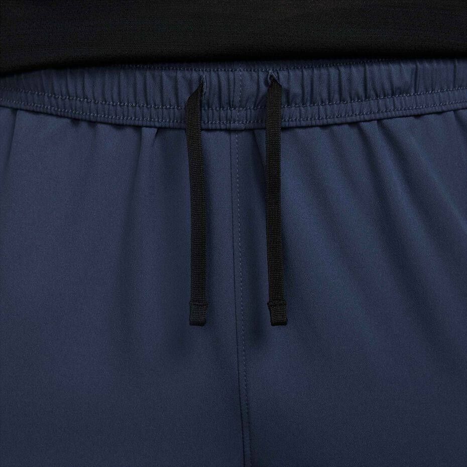 Штани Nike Challenger Dri-Fit Woven Running Trousers FQ4780-437 фото