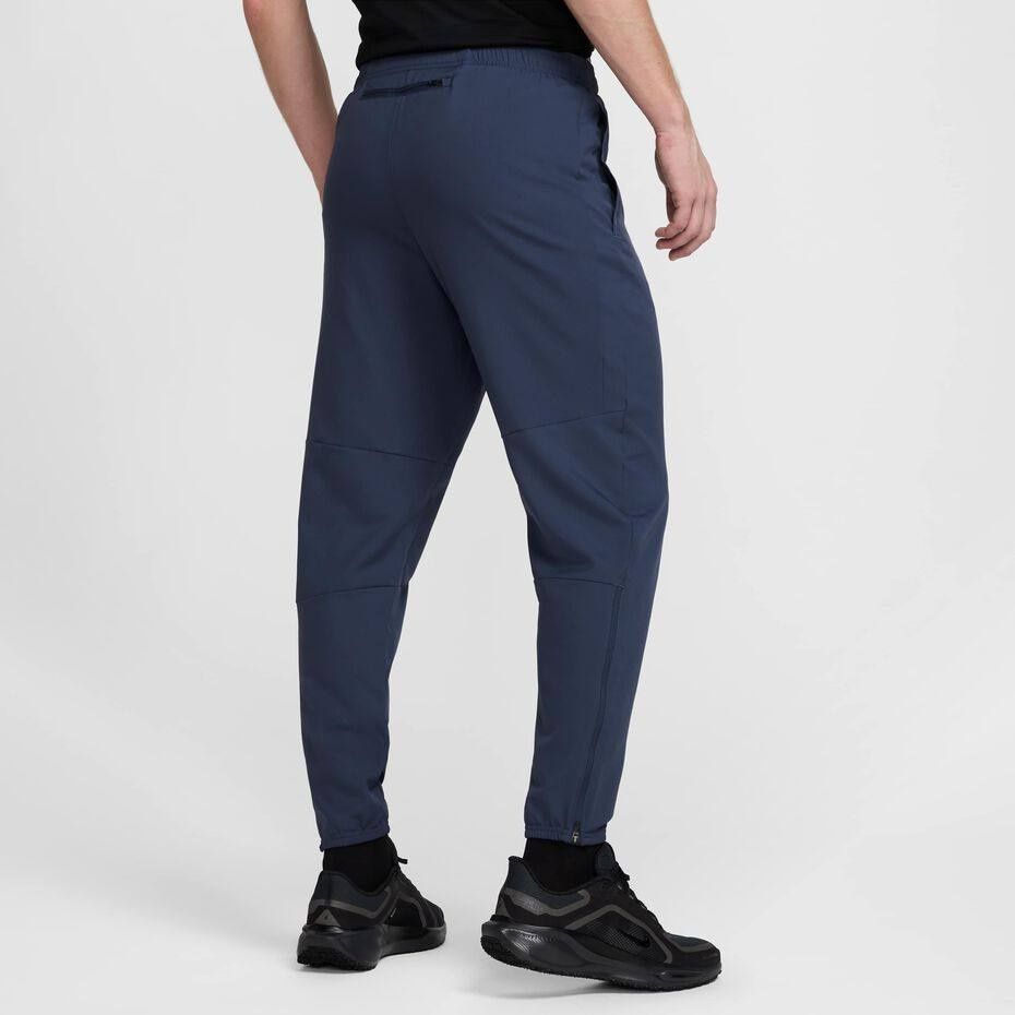 Штани Nike Challenger Dri-Fit Woven Running Trousers FQ4780-437 фото